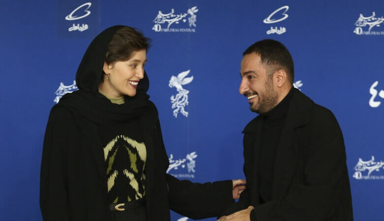 عکس/ لباس عجیب نوید محمدزاده هنگام خروج از کشور سوژه شد